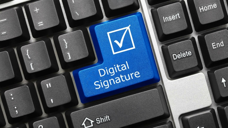 Close-up view on conceptual keyboard - Digital Signature (blue key)